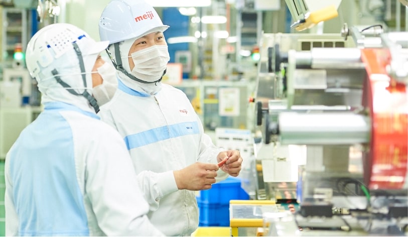 photo of people working at production plant