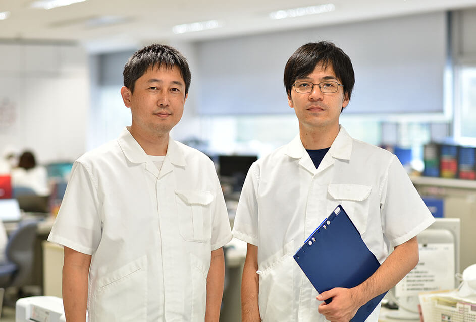an photo two men of KM Biologics