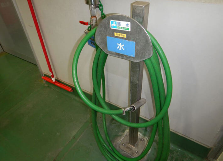 Photo: hose with water-saving nozzle in Asahikawa plant