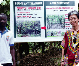 At the demonstration farm with the farmer (left)