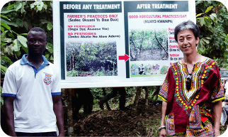 At the demonstration farm with the farmer (left)