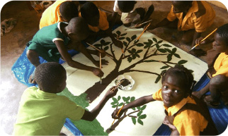 Children drawing enthusiastically