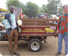 The winner, a young cocoa farmer (left)