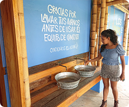 Hand washing area in front of the school building