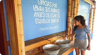 Hand washing area in front of the school building