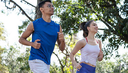 photo of men and women jogging