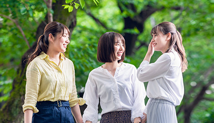 photo of three women laughing