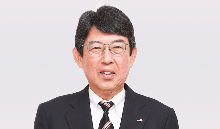 写真：取締役専務執行役員 童子 秀己