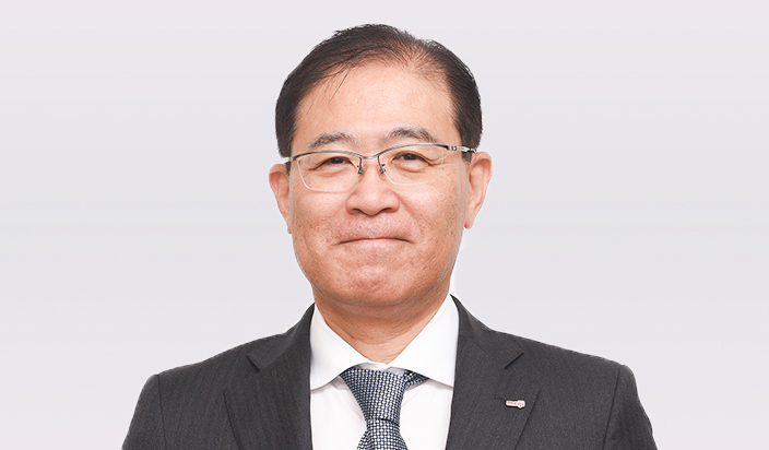 写真：取締役常務執行役員 伊賀 仁