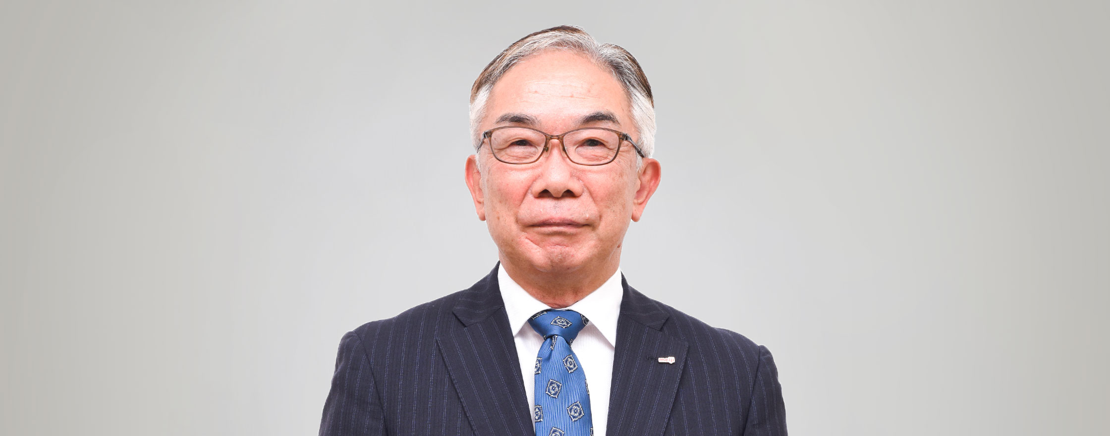 写真:取締役執行役員 COO(食品セグメント) 八尾 文二郎