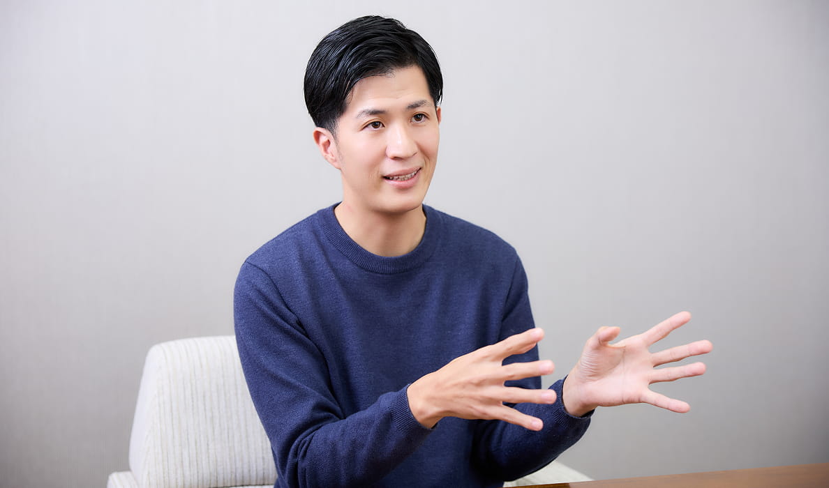 写真：プログラムでの生徒の様子を語る大川